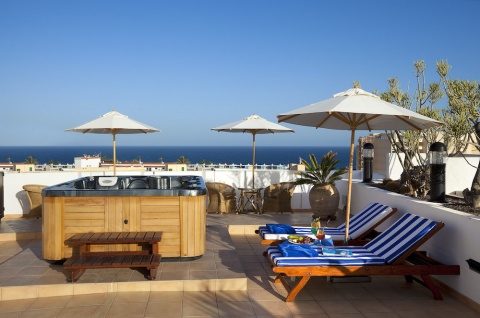 Foto de la terraza privada en el Seaside Sandy Beach